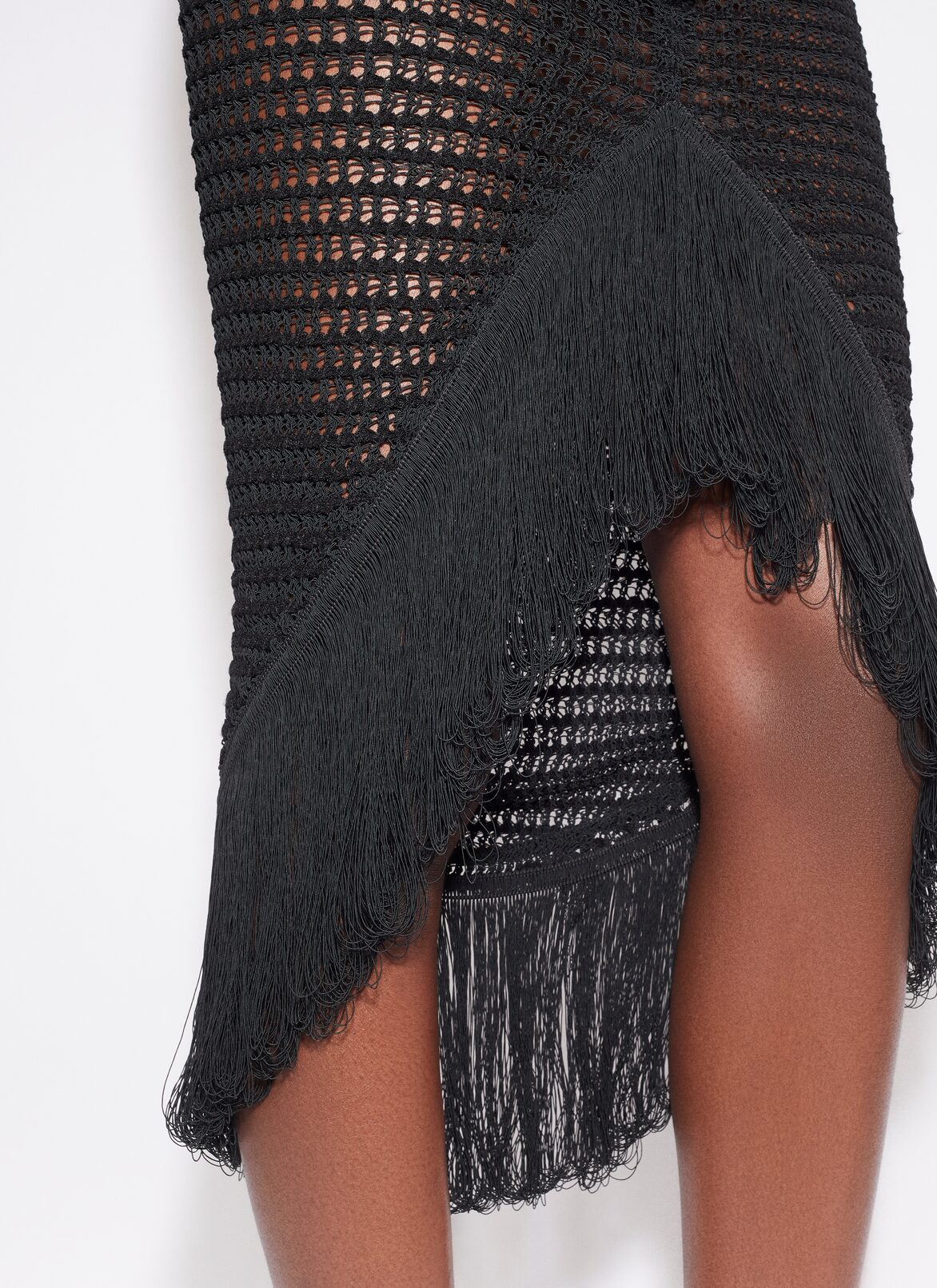 FRINGED BODYCON CROCHET SKIRT ALAÏA BLACK FRINGED BODYCON CROCHET SKIRT